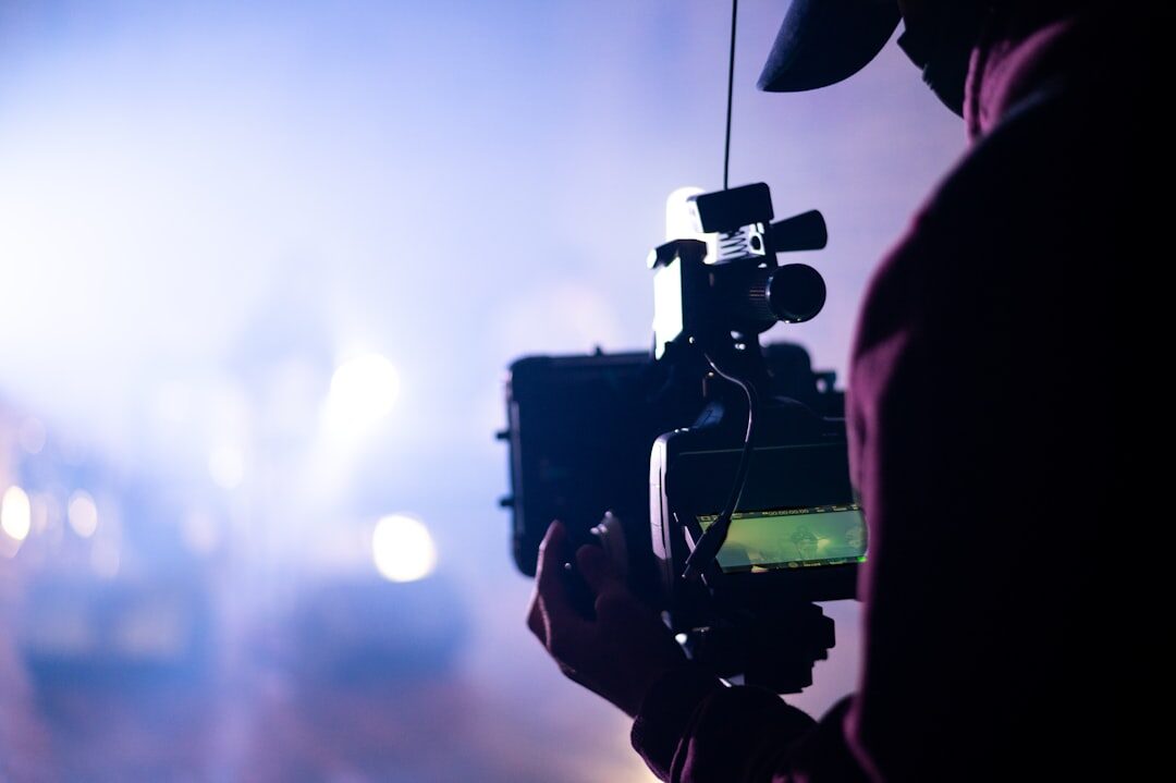 Camera operator filming a live event