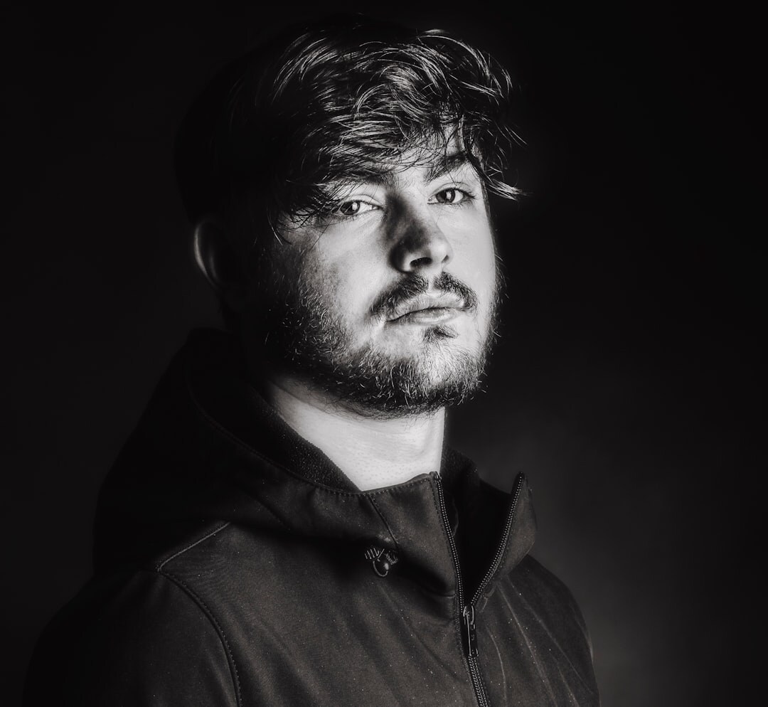 Professional Brazilian male audio engineer with headphones