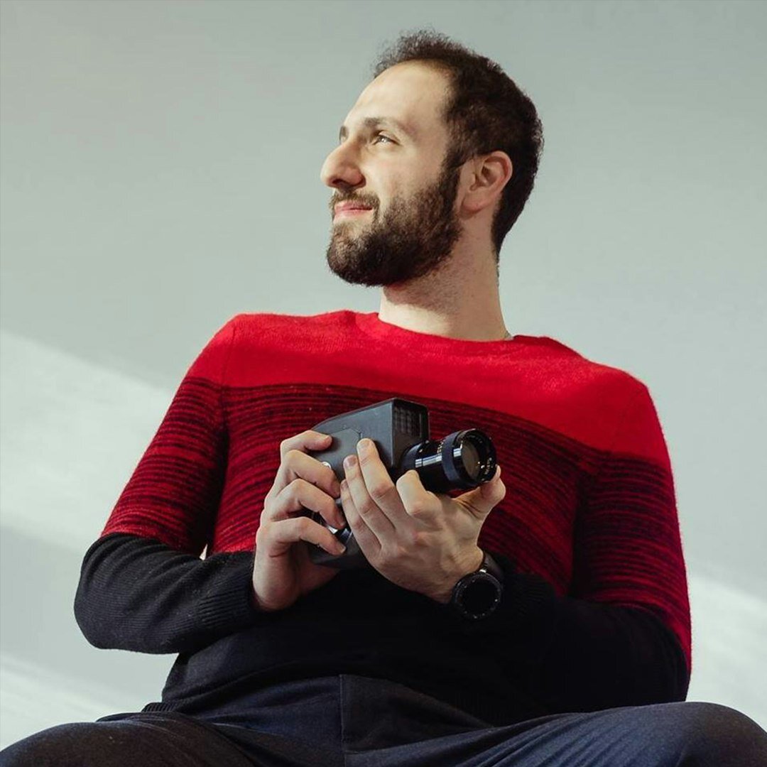 Professional Brazilian male video producer in a studio