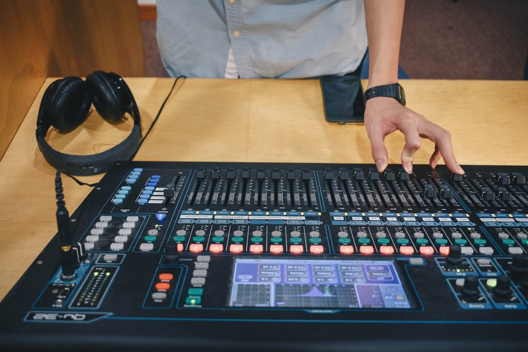 Person working at a broadcast production desk